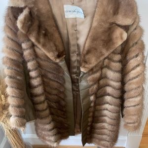 Luxurious and Vintage Davison’s mink and leather coat with leather sash.